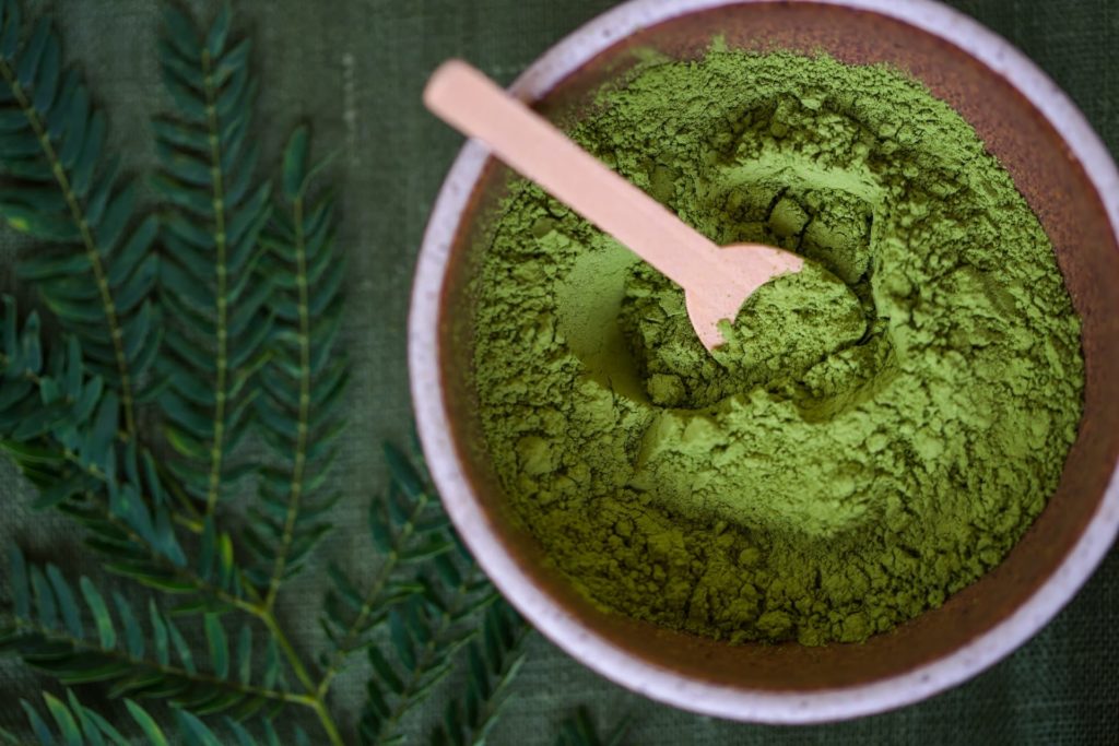 Bowl of spirulina green powder