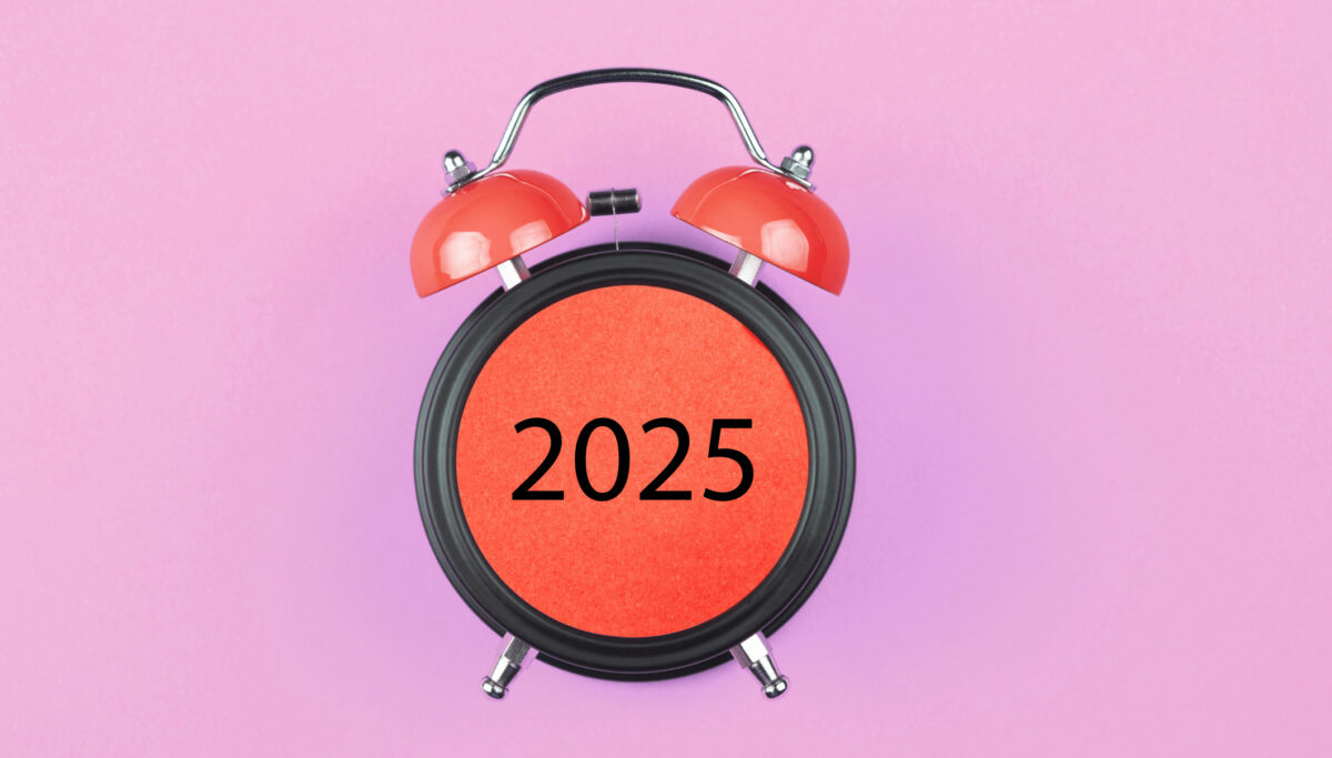 Alarm clock 2025 on pink background