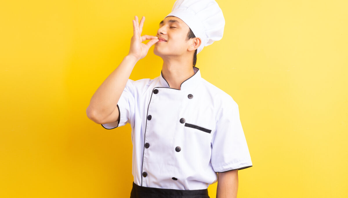 Image of male chef on yellow background