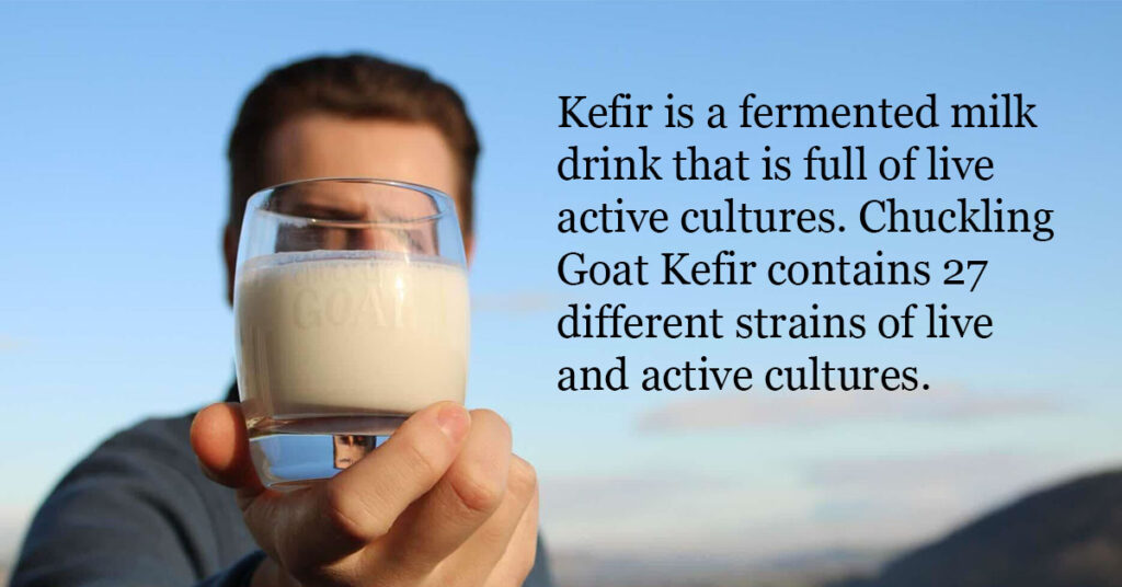 Image of man holding glass of Chuckling Goat Kefir.