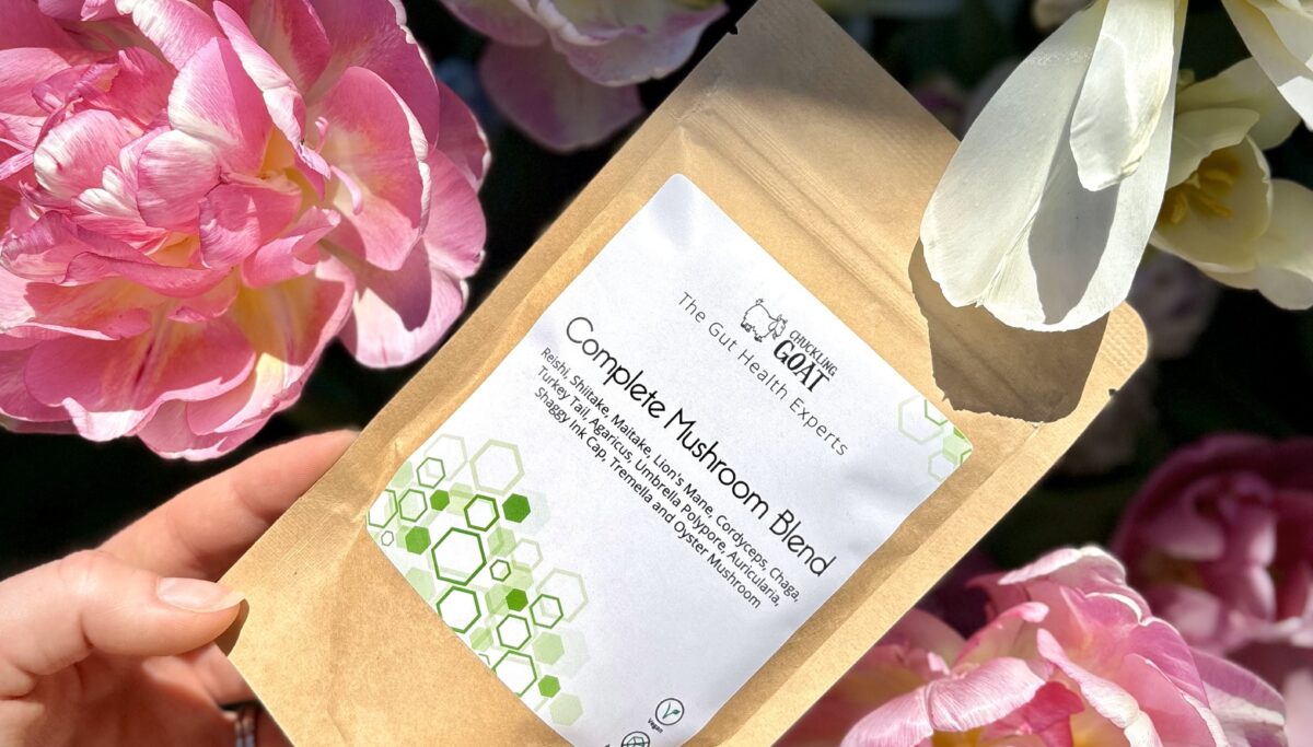 Chuckling Goat Complete Mushroom Blend amongst flowers