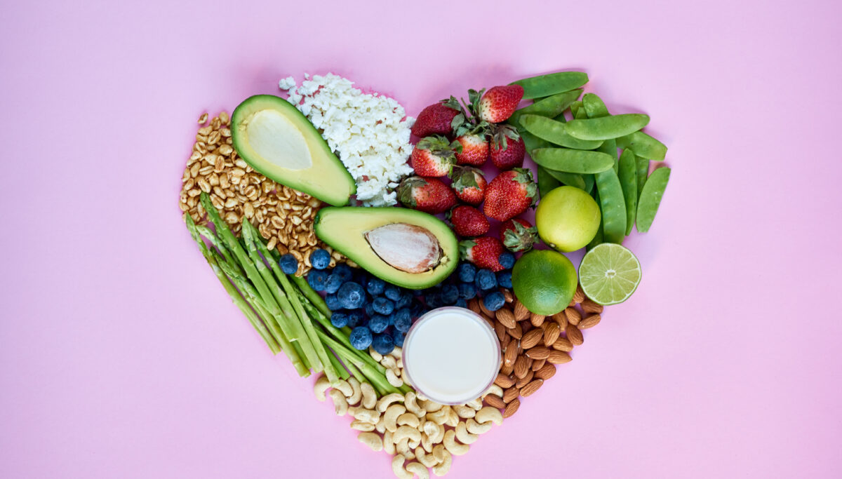 Nuts, berries, vegetables and fruits in shape of heart