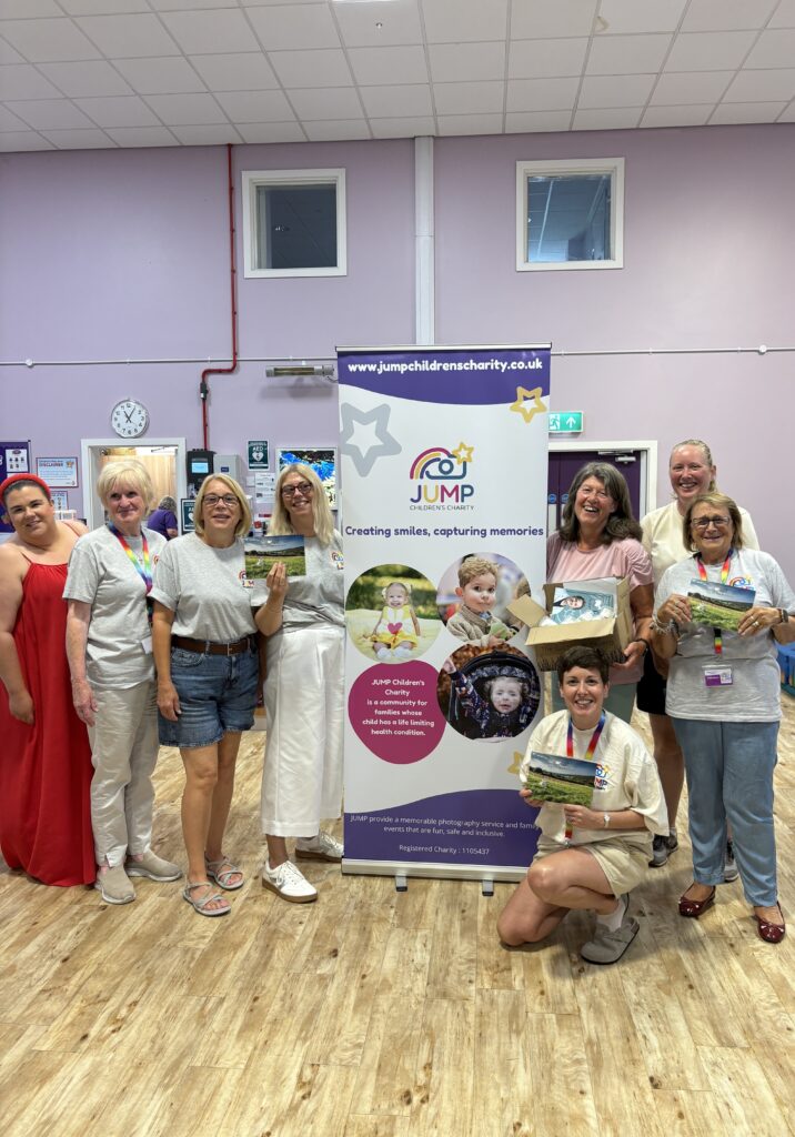 Image of JUMP charity and workers plus box of Chuckling Goat donated goodies.