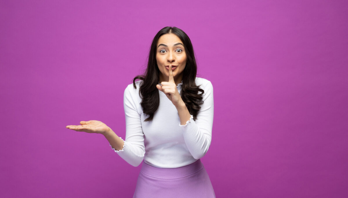 Photo of pretty nice cute charming woman wearing skirt isolated over purple color background