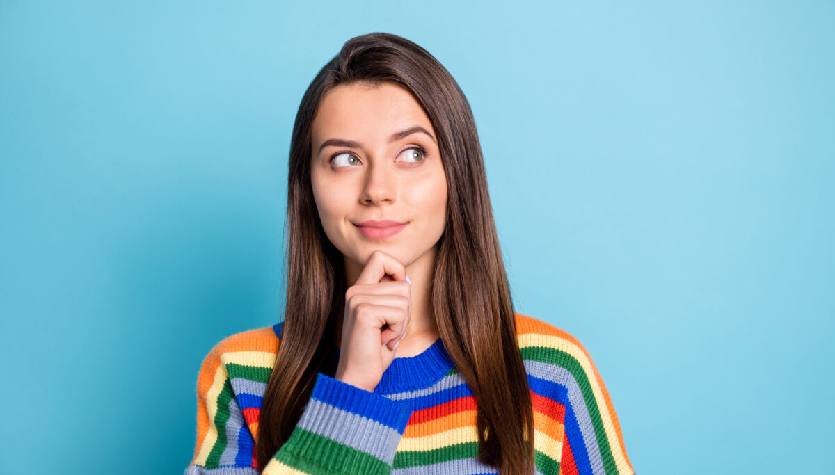 Photo portrait of girl smart thoughtful got idea looking copyspace isolated on bright blue color background